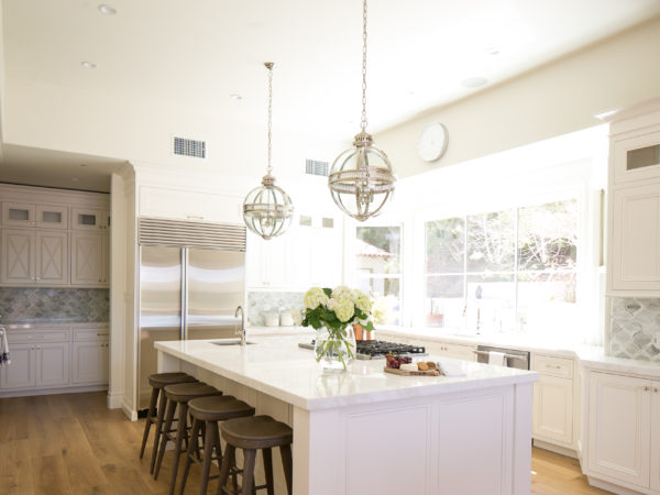 custom-white-kitchen-cabinets-large-island-marble-baroque-mosaic-tile-backsplash-hauser-houses-2
